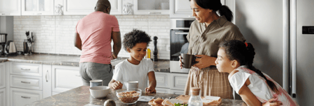 Family spending time together in new kitchen